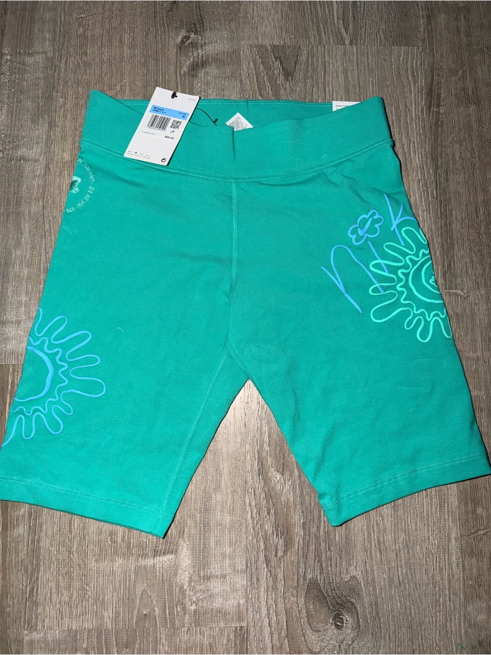 Nike Women’s Teal Athletic Shorts with Light Blue Graphic